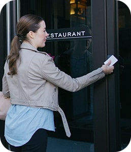 Woman using Guardian Protection access control