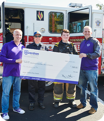 Guardian Protection team members involved showing dedication to community